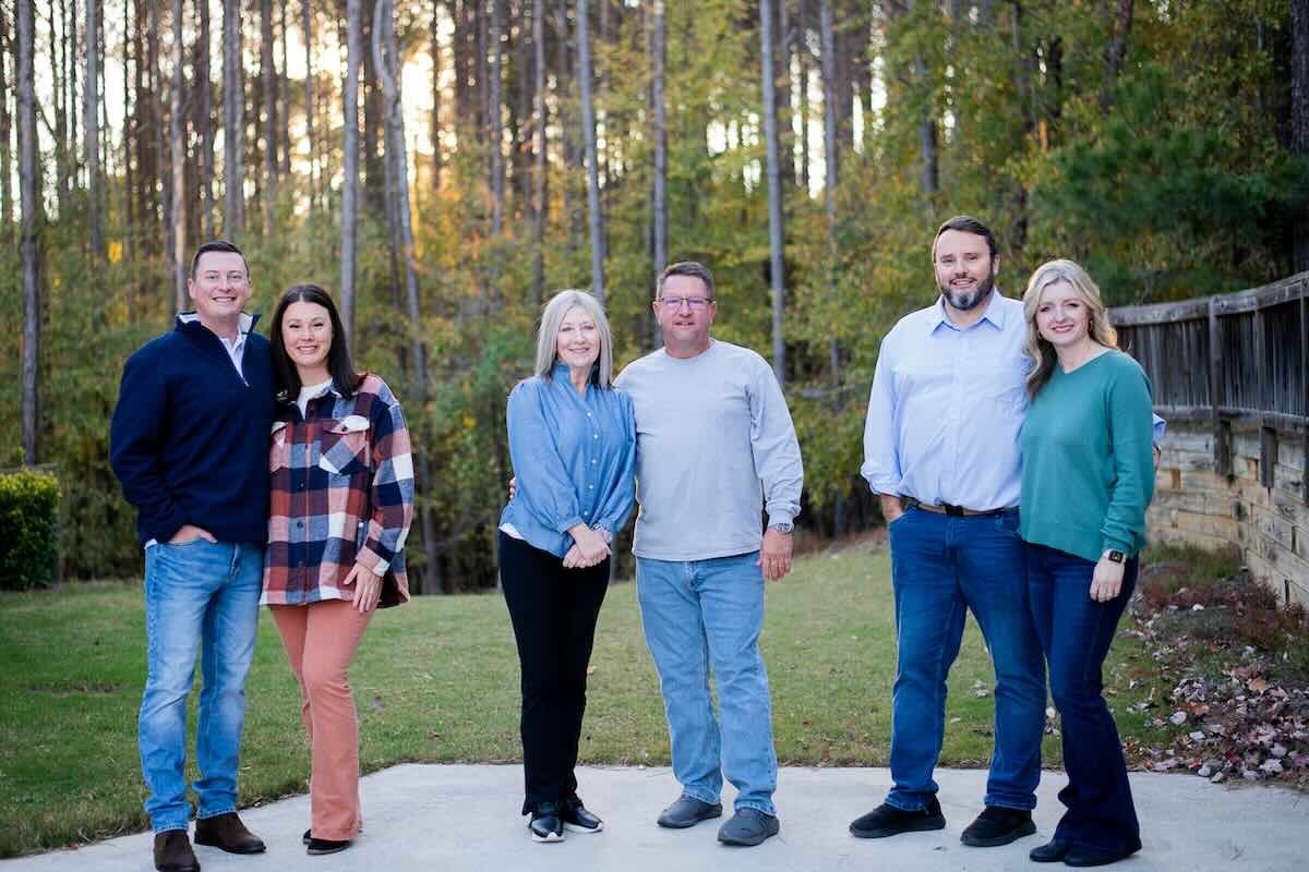 The three Prime Recover founding families together outdoors